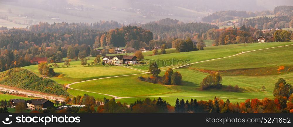 Panoramic view of beautiful mountain rural landscape in Alps with village in the backgroundFantastic views of Austrian green hills. Beauty world. Colorful mountain landscape of austrian alps in Mondsee
