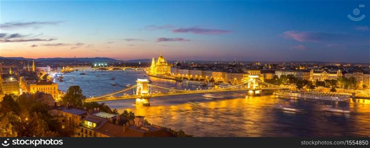Panoramic view of Budapest and Parliament Building in Hungary in a beautiful summer night