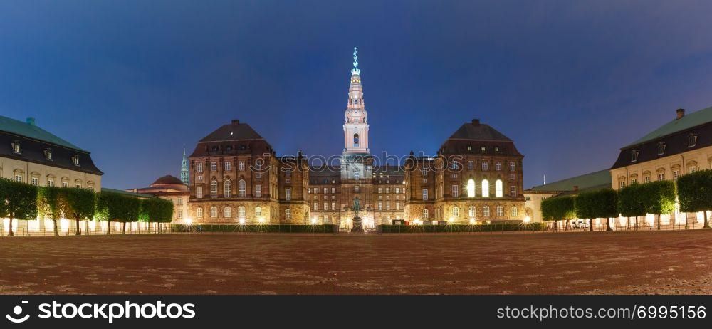 Panoramic view of Christiansborg, palace and government building, the seat of parliament at night, Copenhagen, capital of Denmark. Christiansborg palace in Copenhagen, Denmark