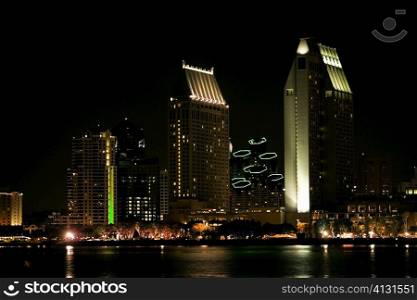 Panoramic view of city at night, San Diego Bay, San Diego, California, USA