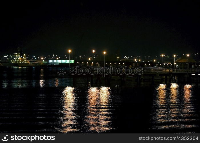 Panoramic view of city at night, San Diego Bay, San Diego, California, USA