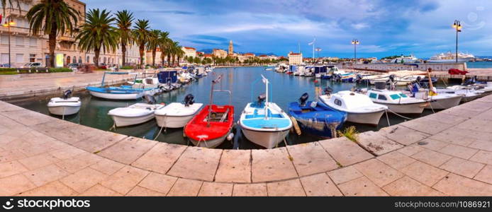 Panoramic view of colorful boats in harbor of Split , the second largest city of Croatia at night. Old Town of Split, Croatia