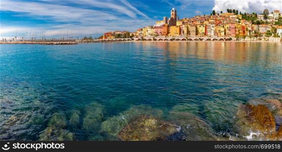 Panoramic view of colorful old town and beach in sunny Menton, perle de la France, on French Riviera, France. Menton, French Riviera, France