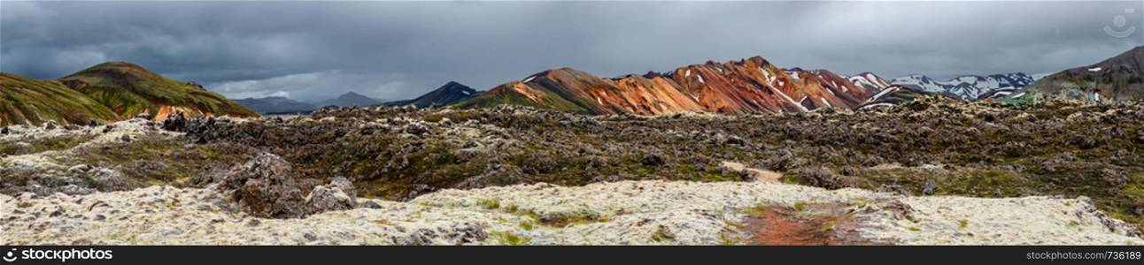 Panoramic view of colorful rhyolite volcanic mountains Landmannalaugar as pure wilderness in Iceland, summer time
