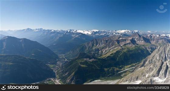 panoramic view of Courmayeur and Aosta Valley from Mont Blanc massif on summer