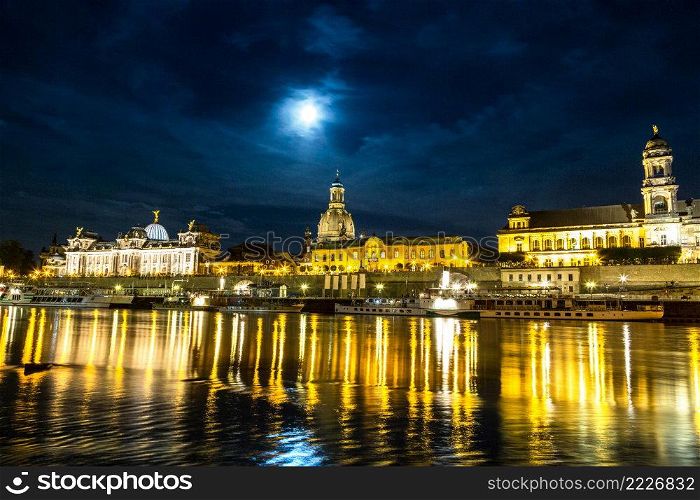 Panoramic view of Dresden in night and the river Elbe.