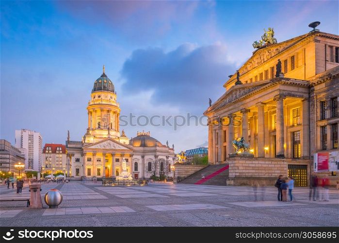 Panoramic view of famous Gendarmenmarkt square at sunset in Berlin Mitte district, Germany