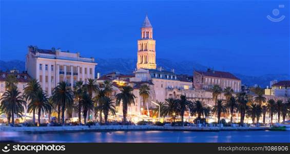 Panoramic view of famous Palace of the Emperor Diocletian and shore of Adriatic Sea in Split, the second largest city of Croatia at night. Old Town of Split, Croatia