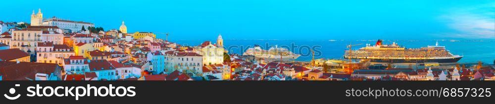 Panoramic view of Lisbon Old Town and sea port with luxury cruise ships. Portugal