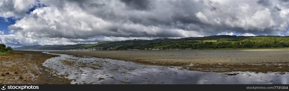 Panoramic view of Lochgilphead estuary at low tide looking out to Loch Gilp in Ayrshire on West coast of Scotland
