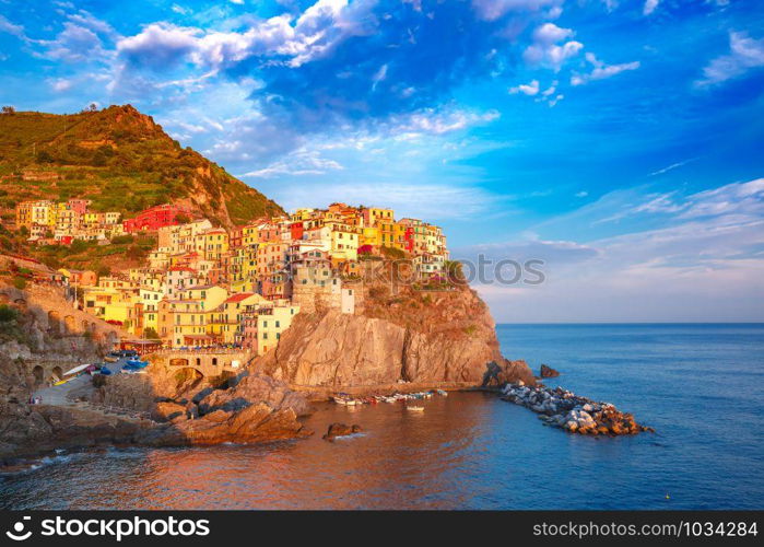 Panoramic view of Manarola fishing village in Five lands, Cinque Terre National Park at sunset, Liguria, Italy. Manarola, Cinque Terre, Liguria