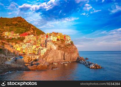Panoramic view of Manarola fishing village in Five lands, Cinque Terre National Park at sunset, Liguria, Italy. Manarola, Cinque Terre, Liguria