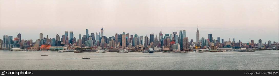 Panoramic view of Manhattan skyline with densely packed skyscrapers