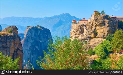 Panoramic view of Meteora and The Holy Monastery of Varlaam on the top of the cliff, Greece - Greek landscape