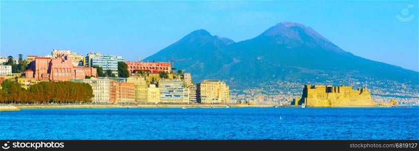 Panoramic view of Naples with Vesuvius mountain at sunset. Italy