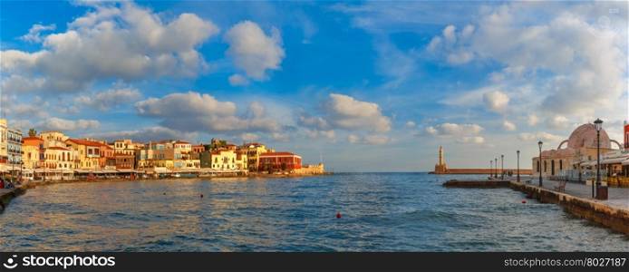 Panoramic view of old harbour of Chania with Lighthouse and Kucuk Hasan Pasha Mosque in summer morning, Crete, Greece