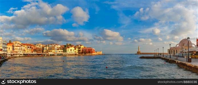 Panoramic view of old harbour of Chania with Lighthouse and Kucuk Hasan Pasha Mosque in summer morning, Crete, Greece. Old harbour in the morning, Chania, Crete, Greece