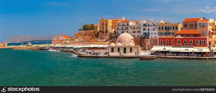 Panoramic view of old harbour of Chania with Venetian quay and Kucuk Hasan Pasha Mosque, Crete, Greece. Panorama of old harbour, Chania, Crete, Greece