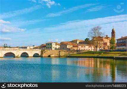 Panoramic view of old town of Rimini with the bridge of Tiberius (Ponte di Tiberio), Italy