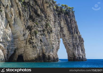 panoramic view of reefs and their formations with variations in the color of the water as it approaches the rocks on the shores of the island of zakynthos