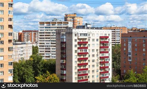 panoramic view of residential district with high-rise houses in Moscow city in sunny summer day