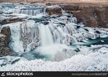 Panoramic view of Reykjafoss waterfall. Varmahlid river in Northern Iceland in winter. Panoramic view of Reykjafoss waterfall, Iceland