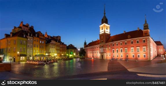 Panoramic view of the castle square at dawn. Warsaw. Poland.. Warsaw. Castle Square in the night illumination at dawn.