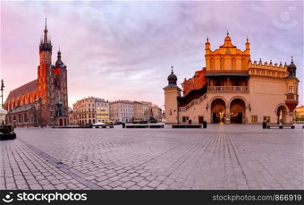 Panoramic view of the Church of St. Mary of the Market Square and cloth rows at dawn. Krakow. Poland.. Krakow. Panorama of the church of St. Mary and the market square.