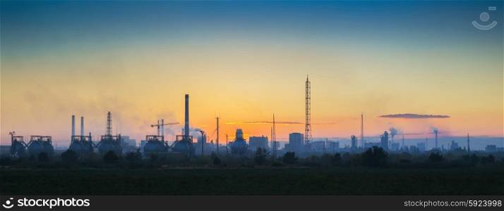 Panoramic view of the industrial landscape at sunset