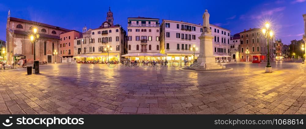 Panoramic view of the old city and medieval square in night illumination. Venice. Italy.. Venice. Panorama. Old Town Square at sunset.