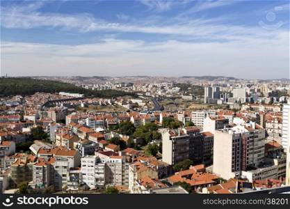 Panoramic view of the orange roofs of the city from the newest Amoreiras Lookout Point in Lisbon, Portugal