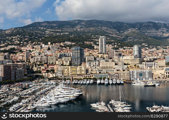 Panoramic view of the port in Monte Carlo, Monaco. Principality of Monaco is a sovereign city state, located on the French Riviera