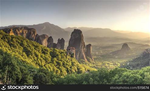 Panoramic view of the Rousanou Monastery in Meteora, Kalambaka town in Greece, on a sunny summer evening. Rousanou Monastery in Meteora, Greece