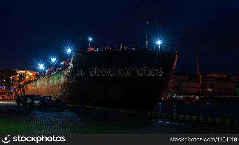 Panoramic view of the sea port and cargo terminal in Odessa, Ukraine, at the summer night. Night at the seaport in Odessa, Ukraine