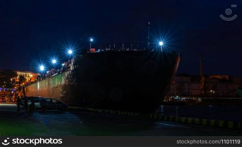 Panoramic view of the sea port and cargo terminal in Odessa, Ukraine, at the summer night. Night at the seaport in Odessa, Ukraine