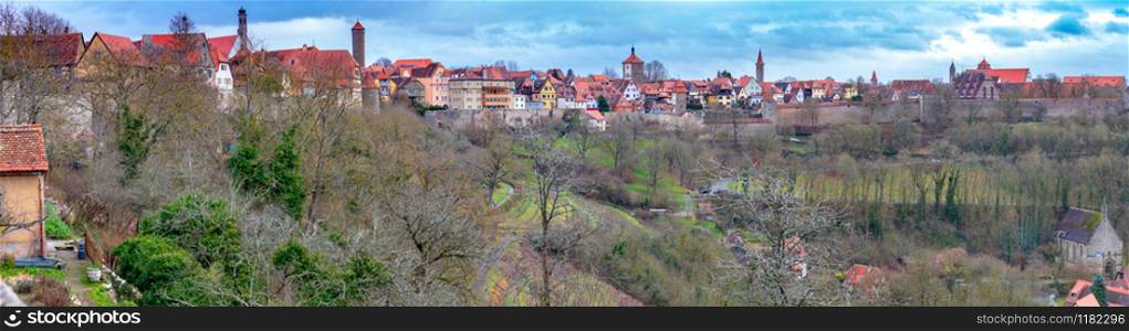 Panoramic view of the stone towers and medieval buildings in the historic city. Rothenburg ob der Tauber. Bavaria Germany.. Rothenburg ob der Tauber. Old famous medieval city.