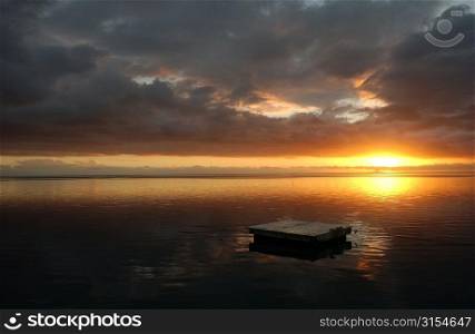 Panoramic view of the sun setting on the sea, Moorea, Tahiti, French Polynesia, South Pacific