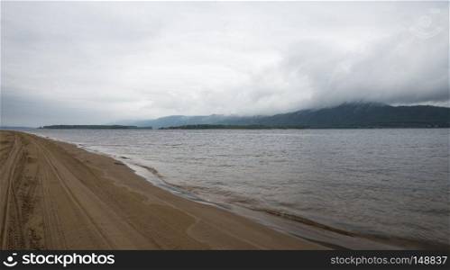 Panoramic view of the Zhiguli mountains from the Peninsula Kopylovo. Cloudy day 21 July 2018.. Panoramic view of the Zhiguli mountains from the Peninsula Kopylovo.
