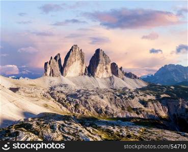 Panoramic view of Tre Cime at beautiful cloudy sunset, Italian Dolomites