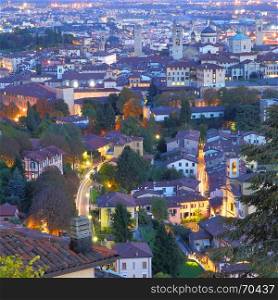 Panoramic view of Upper town of Bergamo at night, Italy