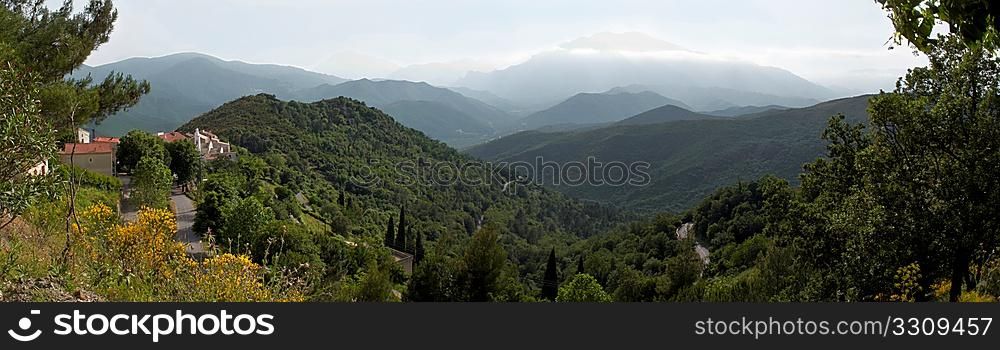panoramic view of villa in Corsica with mountains in background