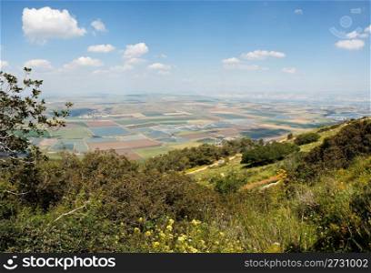 Panoramic view on patchwork of fields from Gilboa mountain in Galilee, Israel