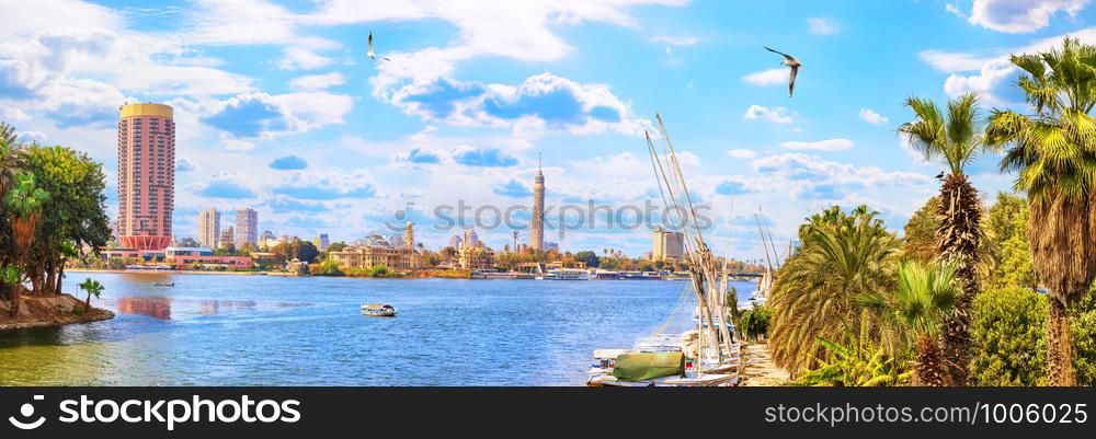Panoramic view on the Nile and the Cairo Tower from the harbour.. Panoramic view on the Nile and the Cairo Tower from the harbour