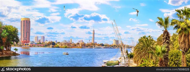 Panoramic view on the Nile and the Cairo Tower from the harbour.. Panoramic view on the Nile and the Cairo Tower from the harbour