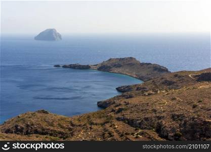 Panoramic view over Kythera from the historical Byzantine Castle of Chora, towards Hytra islet. The majestic scenery of Kythera island in Greece, Mediterranean sea, Europe.. Panoramic sea view from the historical Byzantine Castle of Chora, Mediterranean sea, Europe, Greece.