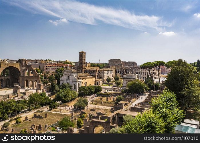 Panoramic view the Colosseum and Roman Forum from Palantine hill, Rome, Italy. Panoramic view the Colosseum (Coliseum) and Roman Forum from Palantine hill, Rome, Italy. The Roman Forum is one of the main tourist attractions of Rome.