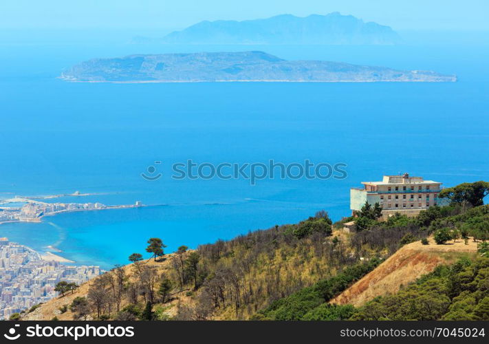 Panoramic view to old multicultural city Trapani on Tyrrhenian coastline with Egadi islands from Erice, Sicily, Italy