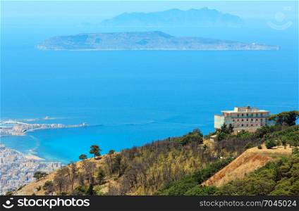 Panoramic view to old multicultural city Trapani on Tyrrhenian coastline with Egadi islands from Erice, Sicily, Italy
