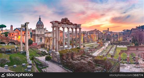 Panoramic viewof ancient ruins of a Roman Forum or Foro Romano at sunsrise in Rome, Italy. View from Capitoline Hill. Ancient ruins of Roman Forum at sunrise, Rome, Italy