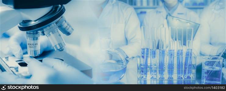Panoramic web banner of microscope in a medical research lab or science laboratory.